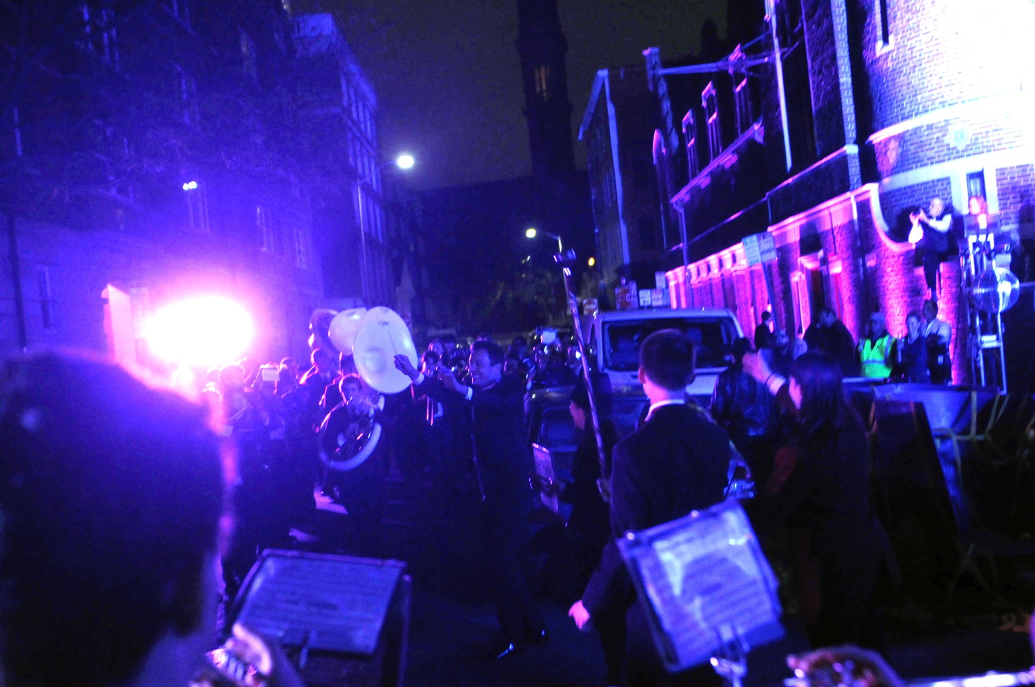 Jimmy Fallon conducts the Harvard University Band outside The Harvard Lampoon Saturday night.