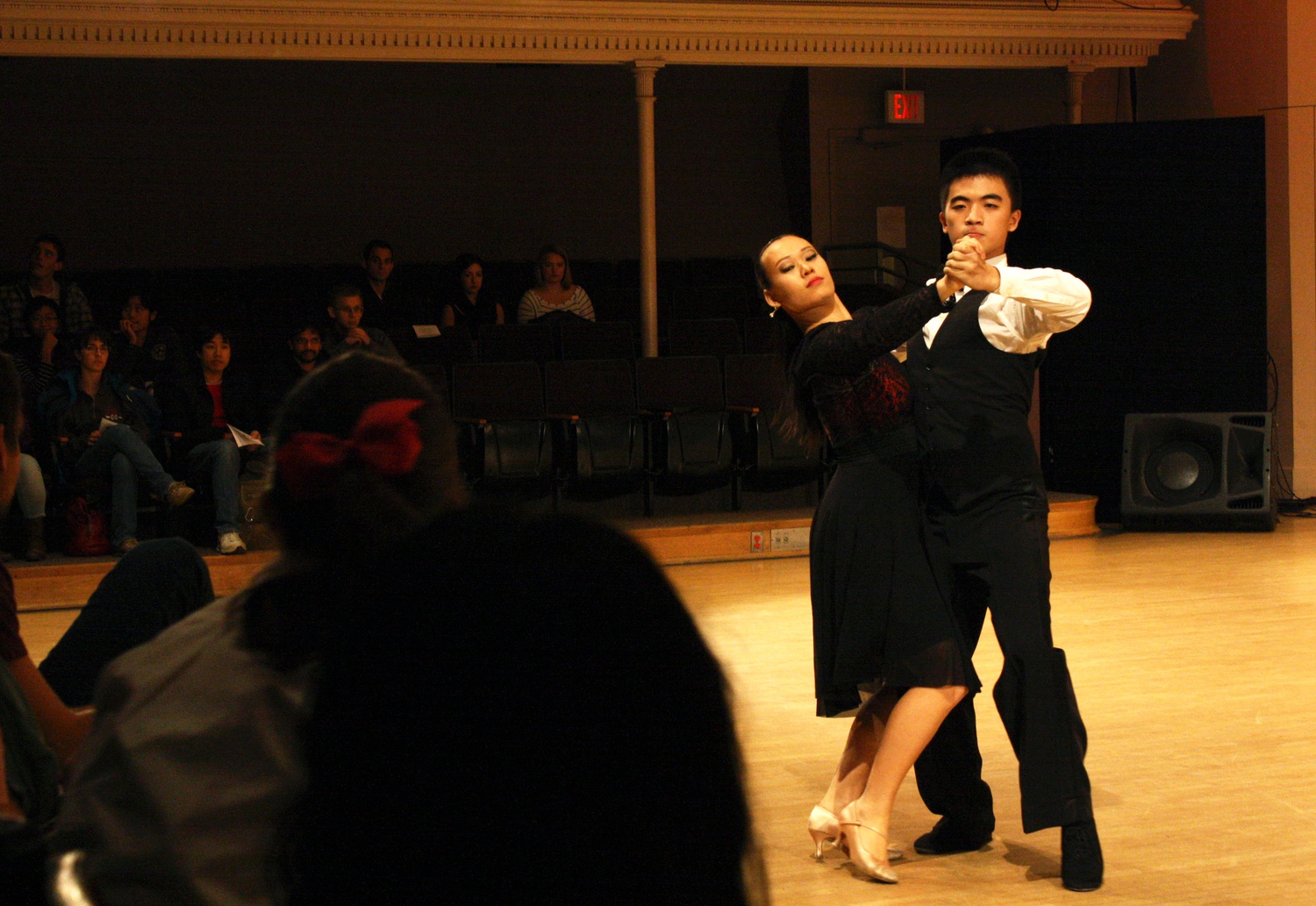 Dan Fu ‘18 and Amelia Wills of Tufts University dance the tango at the Harvard Ballroom Showcase on Friday evening.