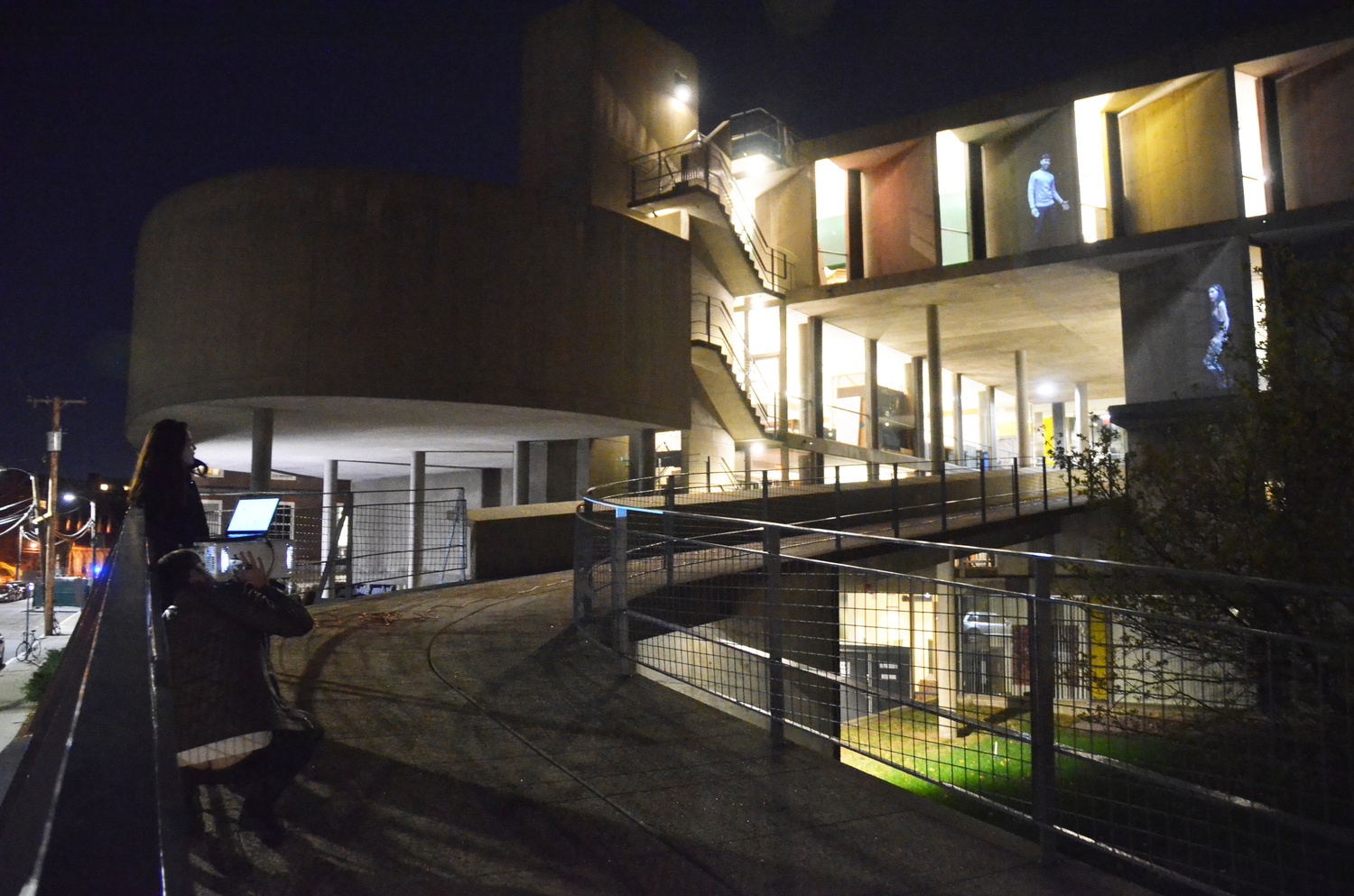 Matthew Gindlesperger and Ryu Kim, second-year students at the Graduate School of Design, set up a projection at the Carpenter Center for the Visual Arts on Monday evening. According to the Gindlesperger and Kim, the project is inspired by the Bauhaus idea of mixing different artistic disciplines in design.
