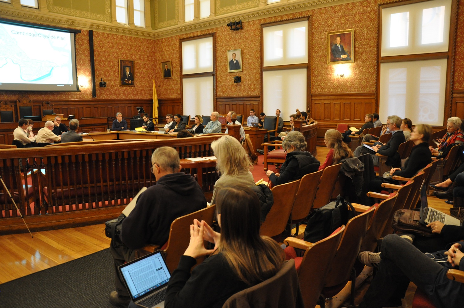 Members of the Cambridge City Council hold a meeting in the Sullivan Chamber at Cambridge City Hall on Monday evening.