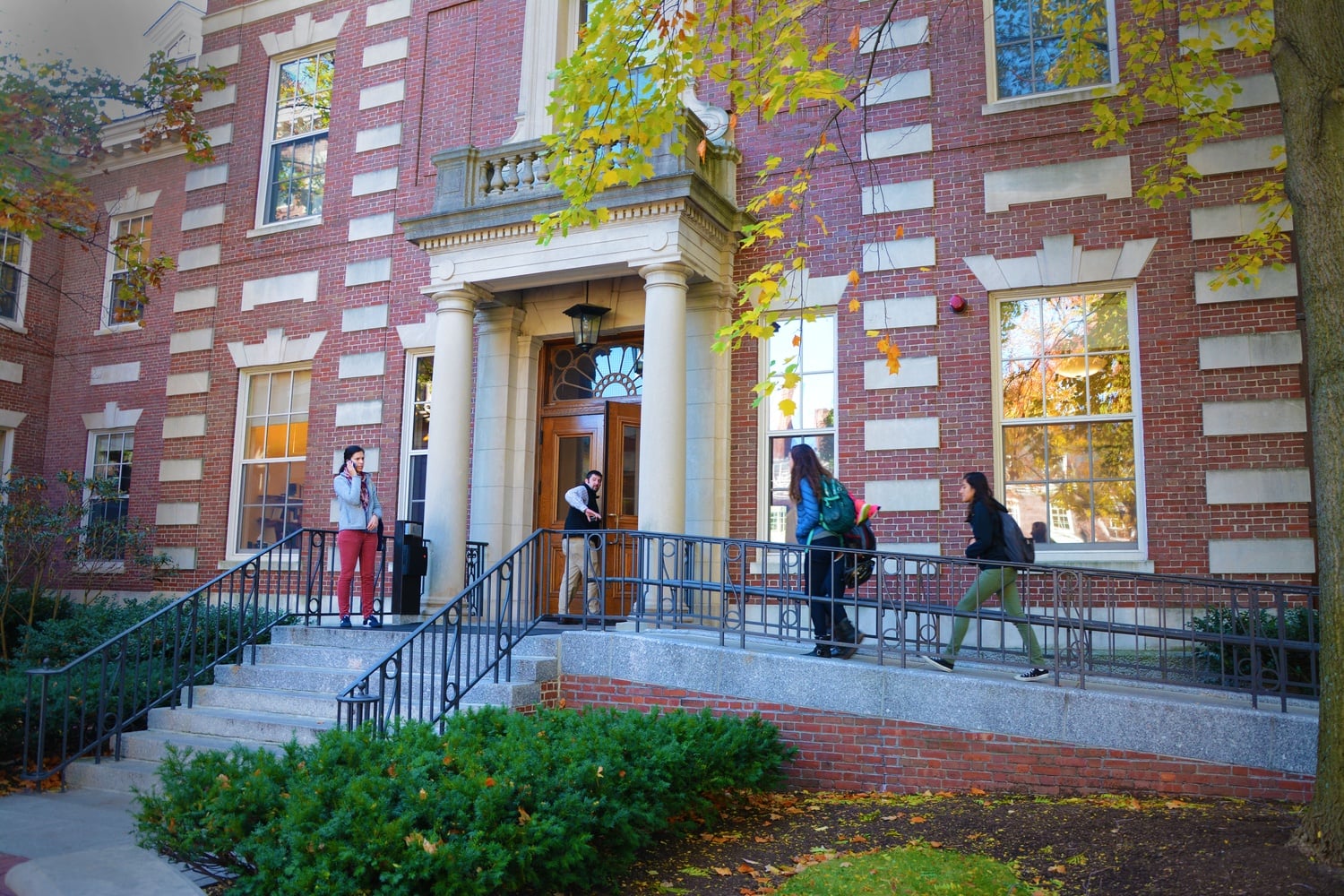 Students and faculty flow in and out of the Barker Center, home to the Humanities Center at Harvard, on a Monday morning.