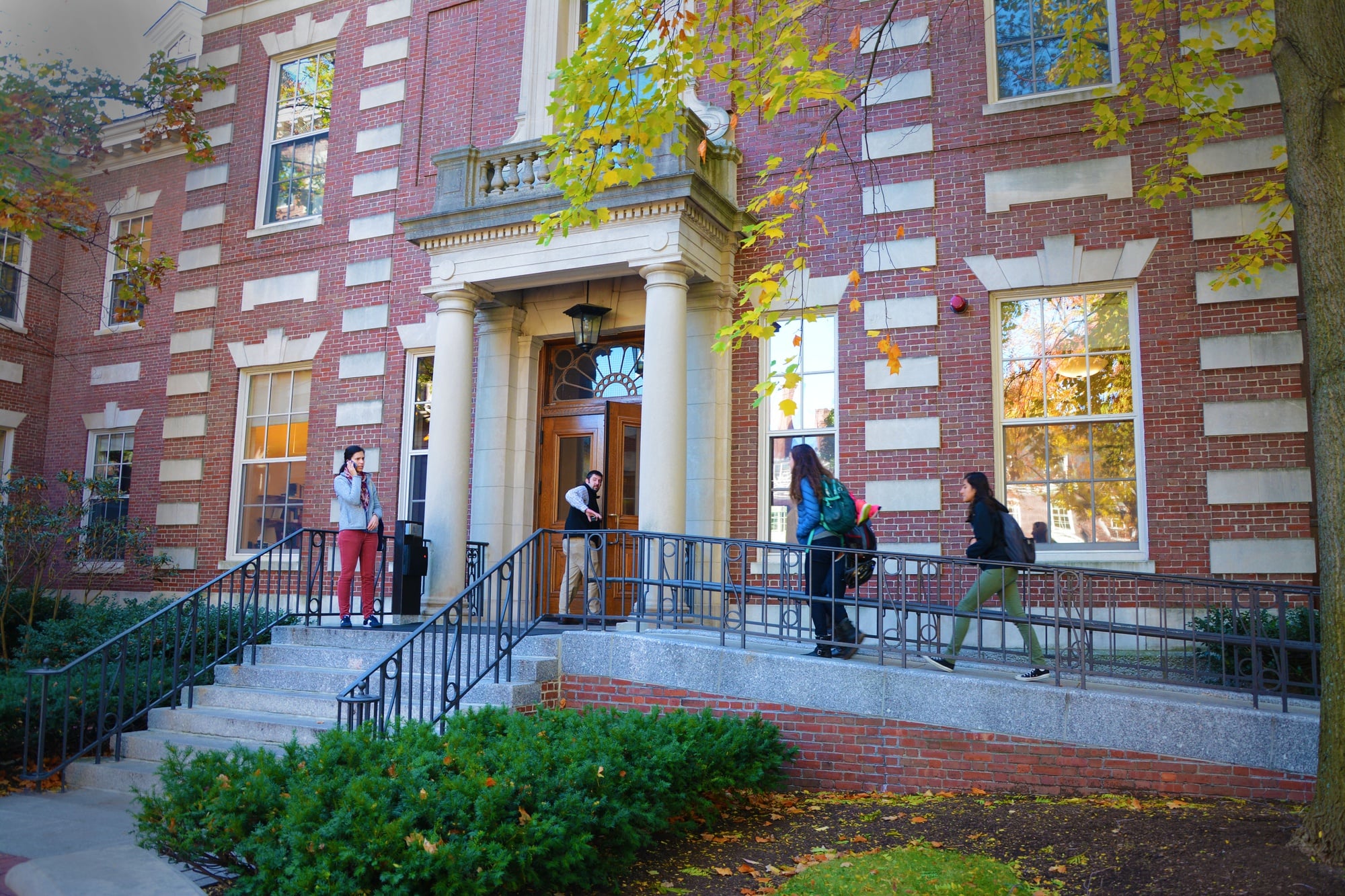 Students and faculty flow in and out of the Barker Center, home to the Humanities Center at Harvard, on a Monday morning.