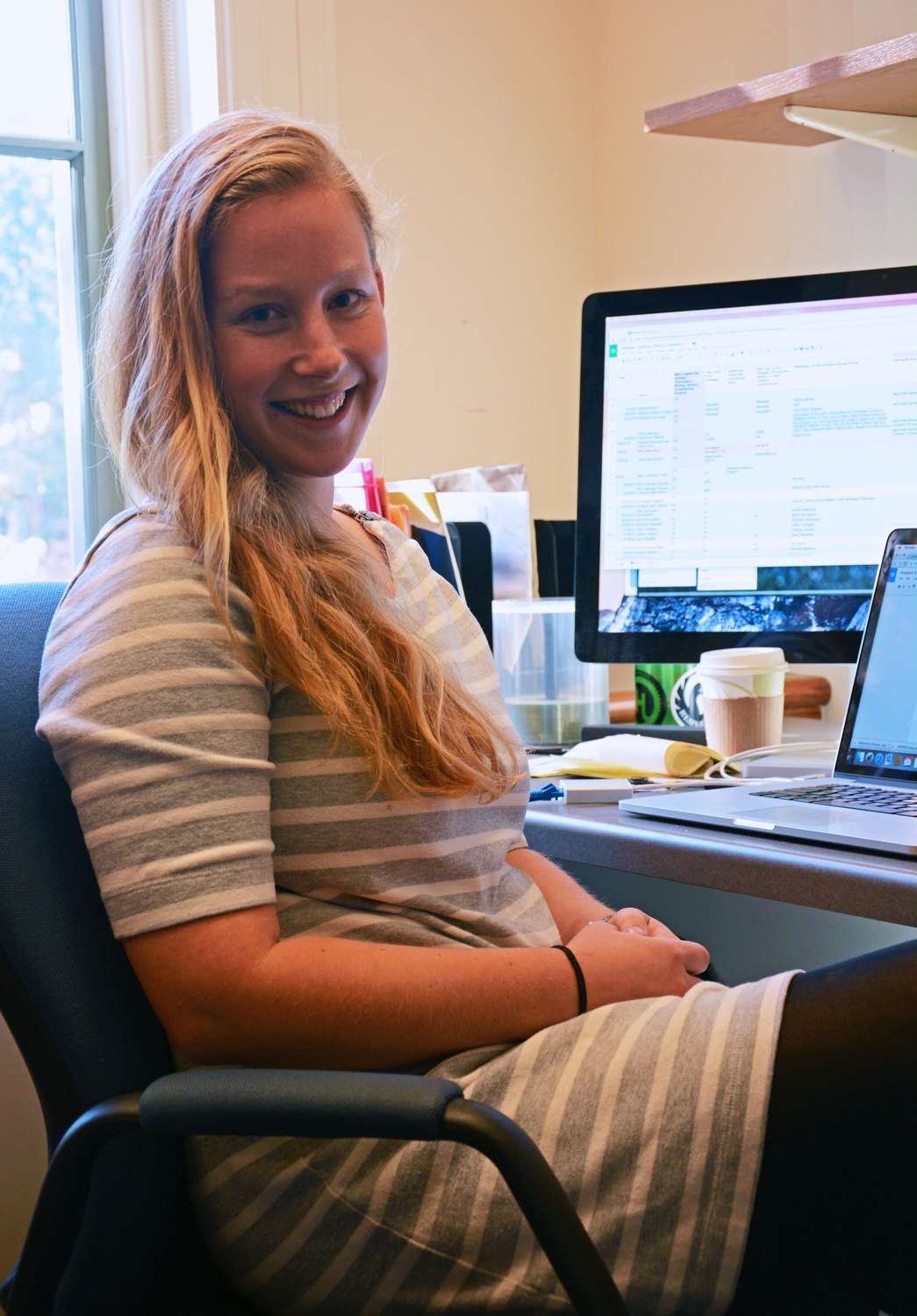 Leah Reis-Dennis ’13 works in the office of the "Poetry in America" course, located in the Barker Center. During her time at Harvard, Reis-Dennis concentrated in History and Literature.