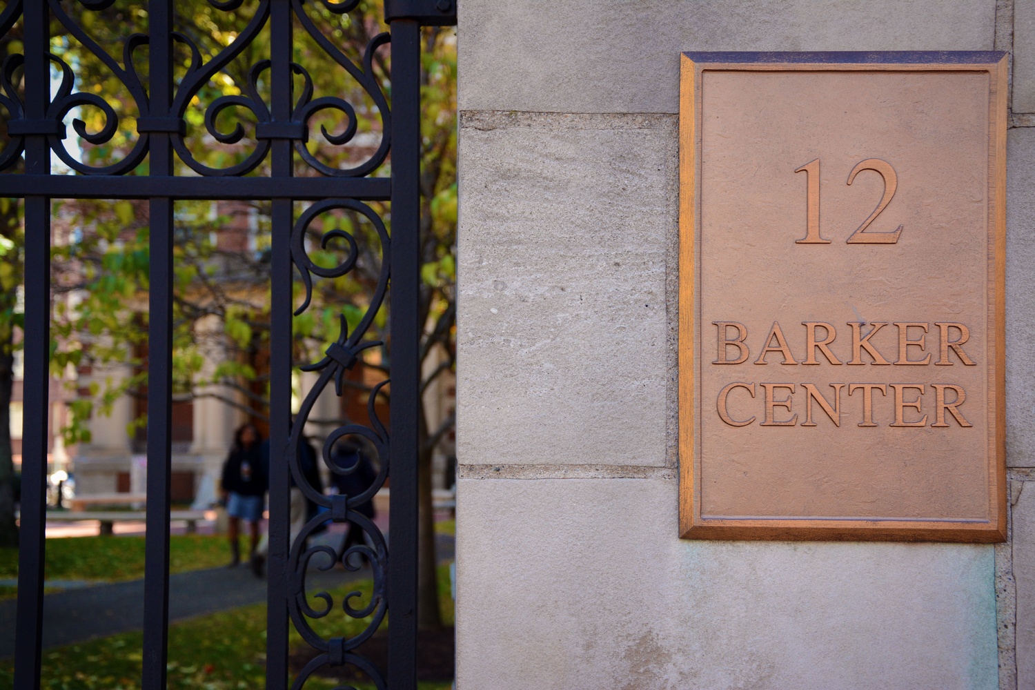 The gate to the Barker Center, home to several English and humanities courses, is located across the street from Lamont Gate.