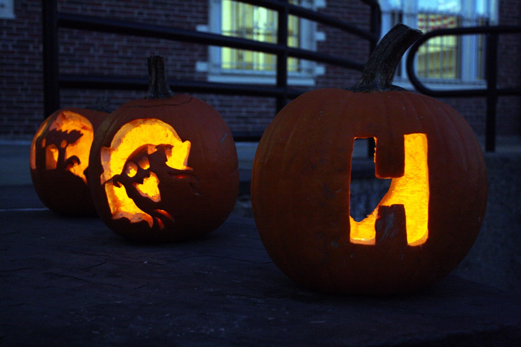 Student-carved pumpkins create a festive and spooky atmosphere on Friday evening.