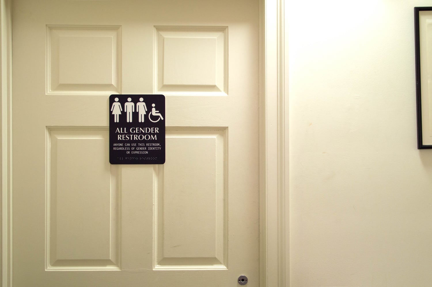 An Adams House bathroom features an “All Gender Restroom” sign.