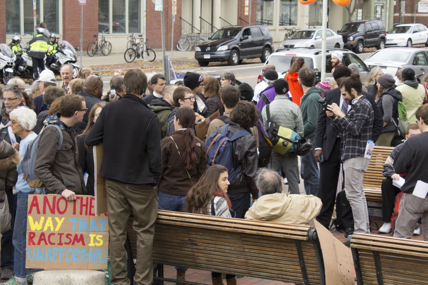 Attendees of the “We Matter! Jobs & Housing Rally” fill Massachusetts Ave. in front of Cambridge City Hall Sunday. The rally, organized by Black Lives Matter Cambridge, called on candidates for Cambridge City Council to address a perceived lack of affordable housing and wage security.