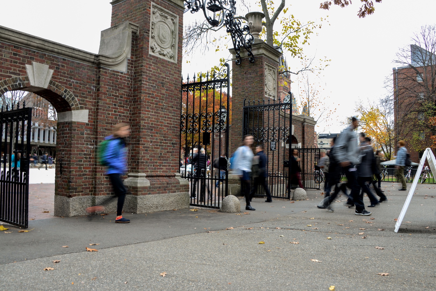 Students rush through Meyer Gate, featured as part of a historical military tour led by military veteran Specialist J. Holden Gibbons.  George von Lengerke Meyer, Class of 1879, was named secretary of the Navy in 1909 by President William Howard Taft. 