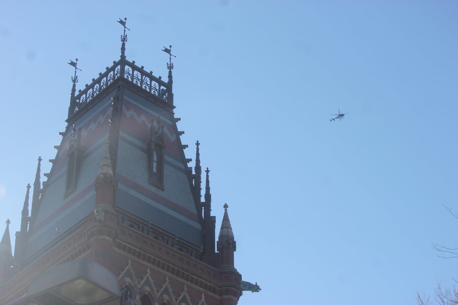 A helicopter flies over Memorial Hall following reports of an unconfirmed bomb threat on Monday.