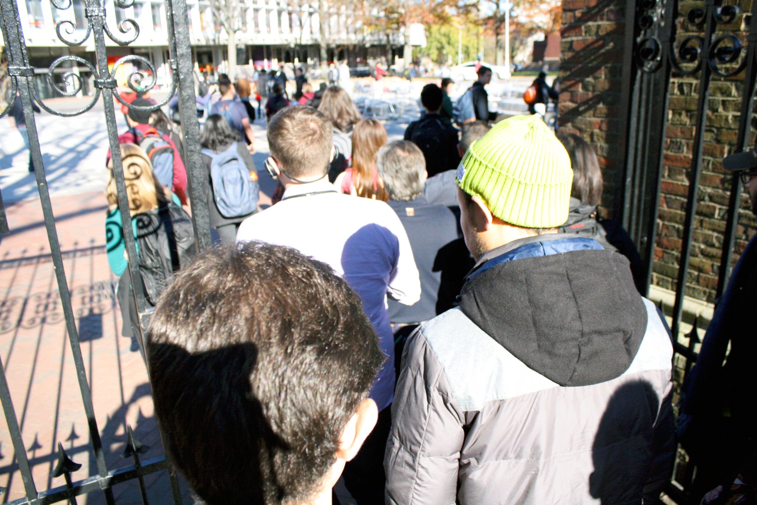 Students stream out of Harvard Yard. Photographer: Michelle M. Ng
