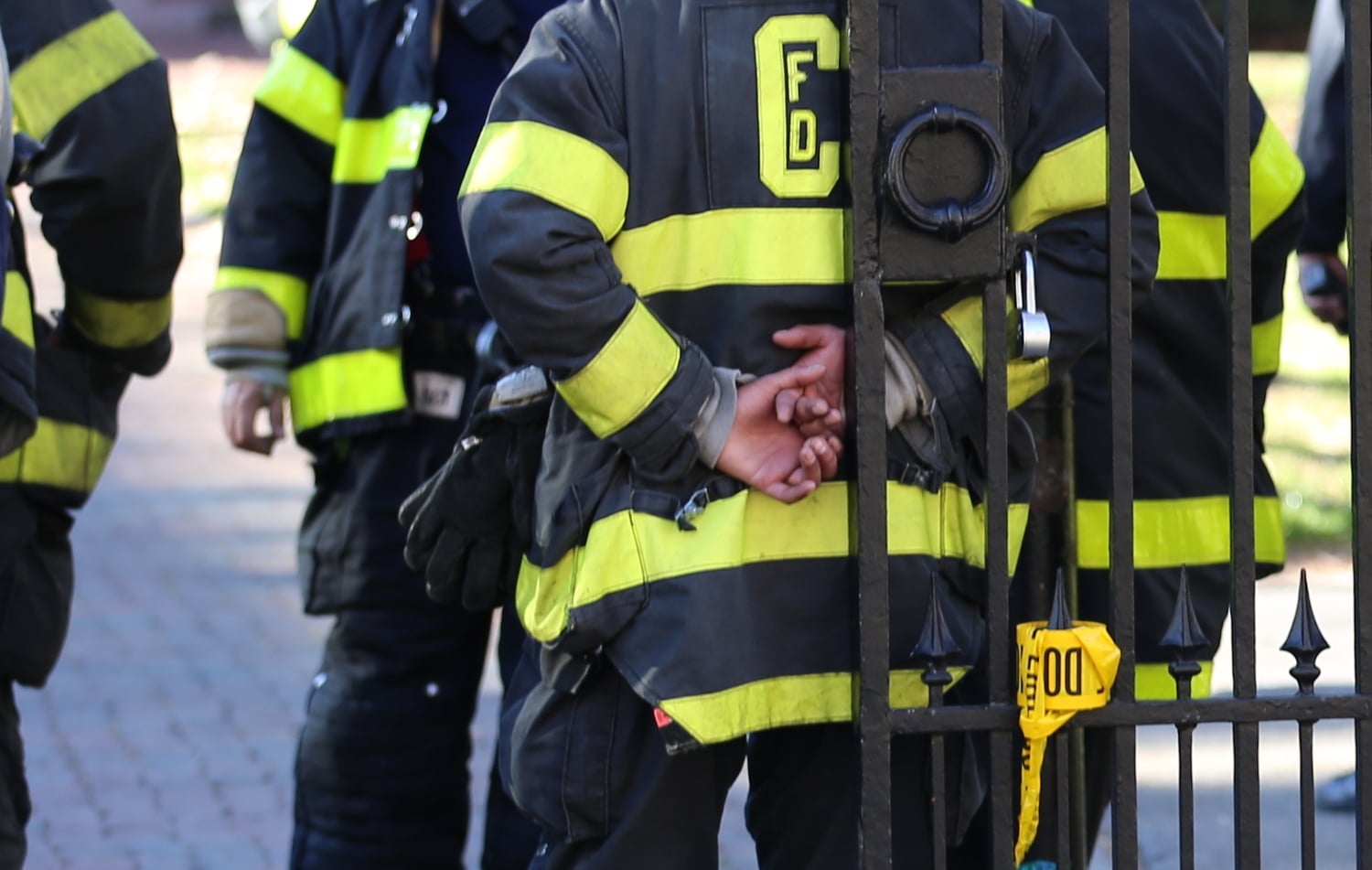Firefighters stand outside Sever Hall. Photographer: Lauren A. Sierra