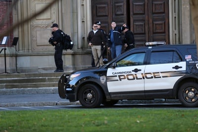 Cover image for Cambridge Police to Retire Camouflage Uniforms, Reduce Weapon Inventory