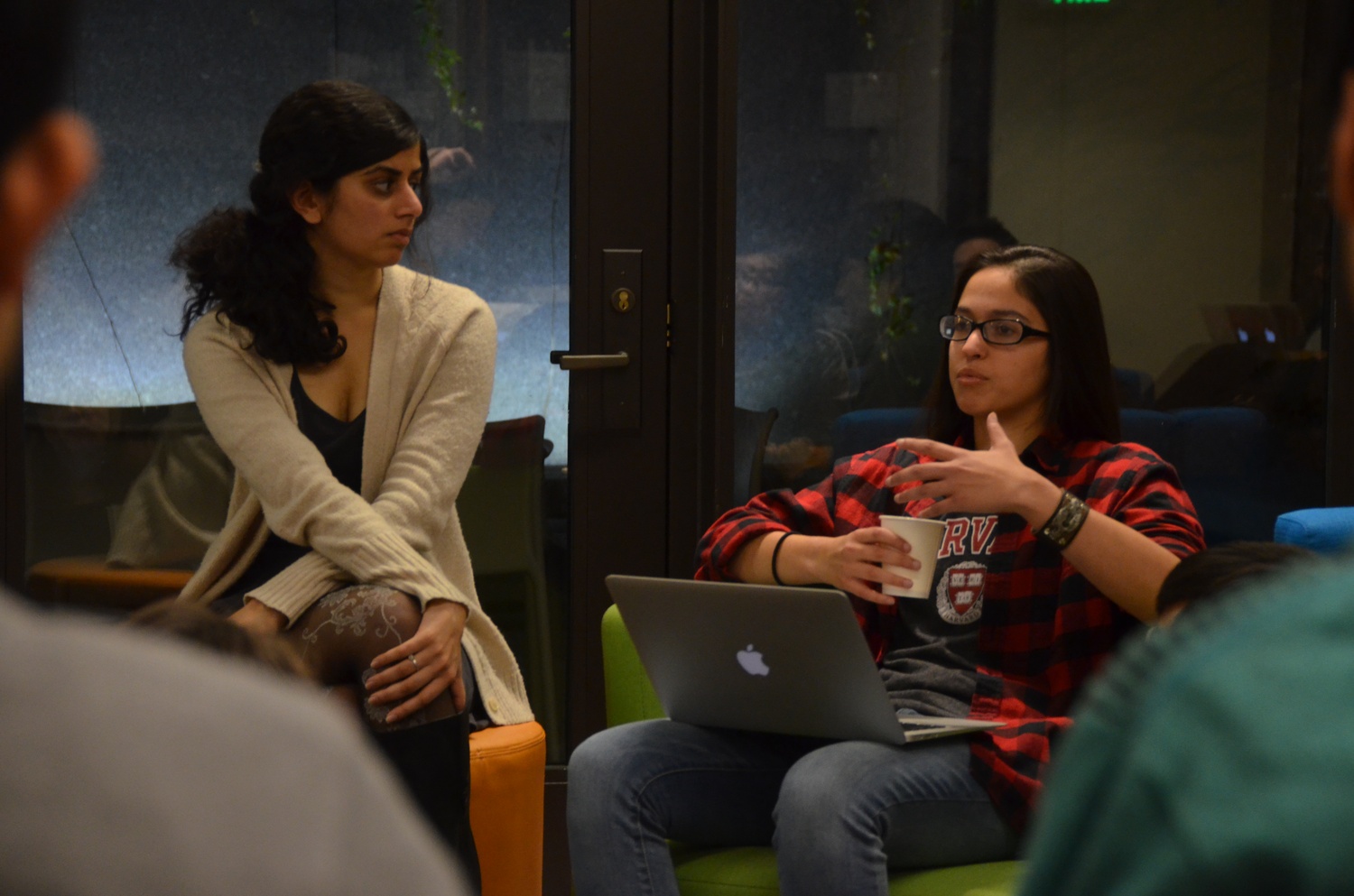 Avni Nahar ’18, left, and Jess Erion ’19, interns at the Harvard Foundation, moderate a discussion on affirmative action and race-based admissions Monday. 