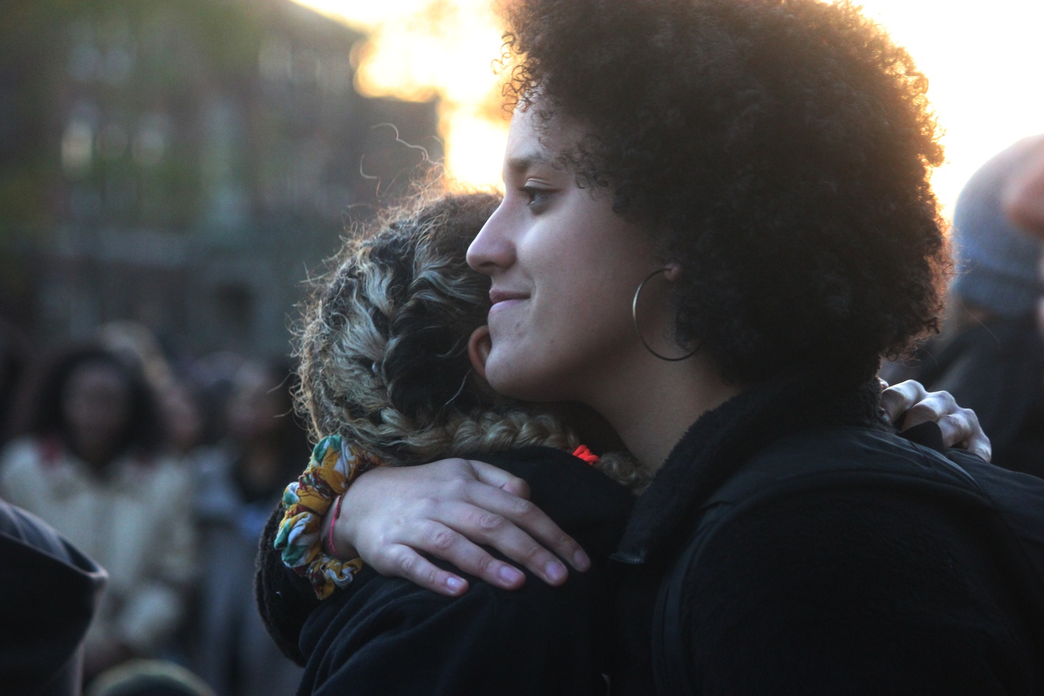 Kimiko M. Matsuda-Lawrence ’16 and Jenny A. Gathright ’16 embrace after performing a spoken-word poetry piece during a rally for National Call to Action Day. Members of the Harvard community gathered to march in solidarity with those who have been affected by recent incidents of racism and discrimination on college campuses.
