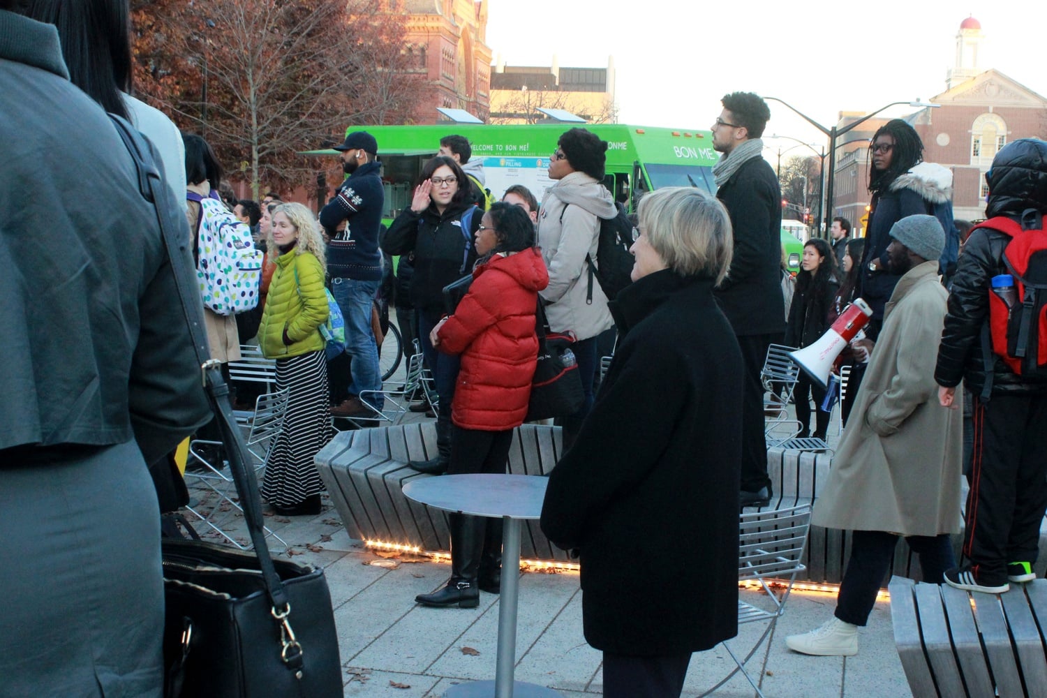 University President Drew G. Faust watches as students demonstrate at the Science Center Plaza as part of the a nationwide effort to coordinate events around the country in support of those who have been affected by recent incidents of racism and discrimination on college campuses.
