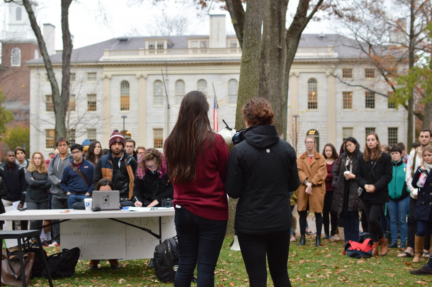 Students convened outside of Massachusetts Hall in 2015 to call on the College to commit more resources and attention to preventing sexual assaults on campus.