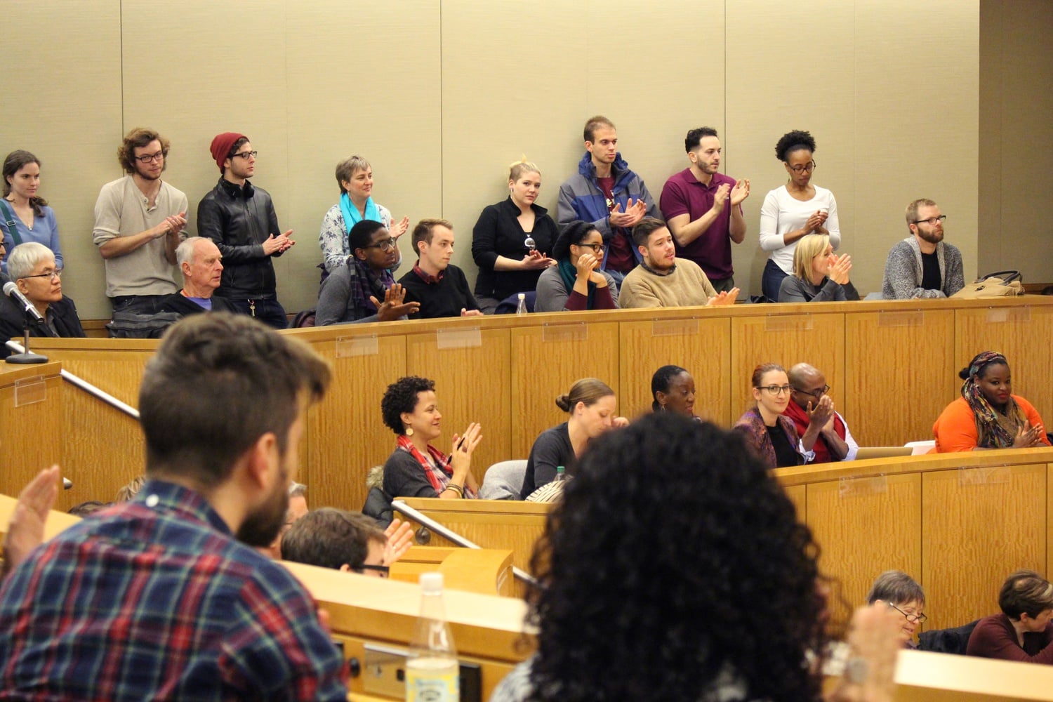 The audience applauds as moderator and assistant history professor Elizabeth Hinton introduces the members of a panel entitled “Generations of Struggle: St. Louis from Civil Rights to Black Lives Matter” on Thursday afternoon.