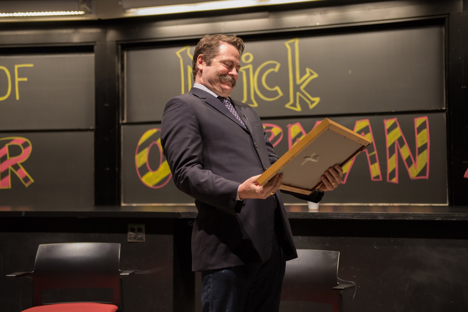 Nick Offerman chuckles at his "Harvard Degree" from IGP.