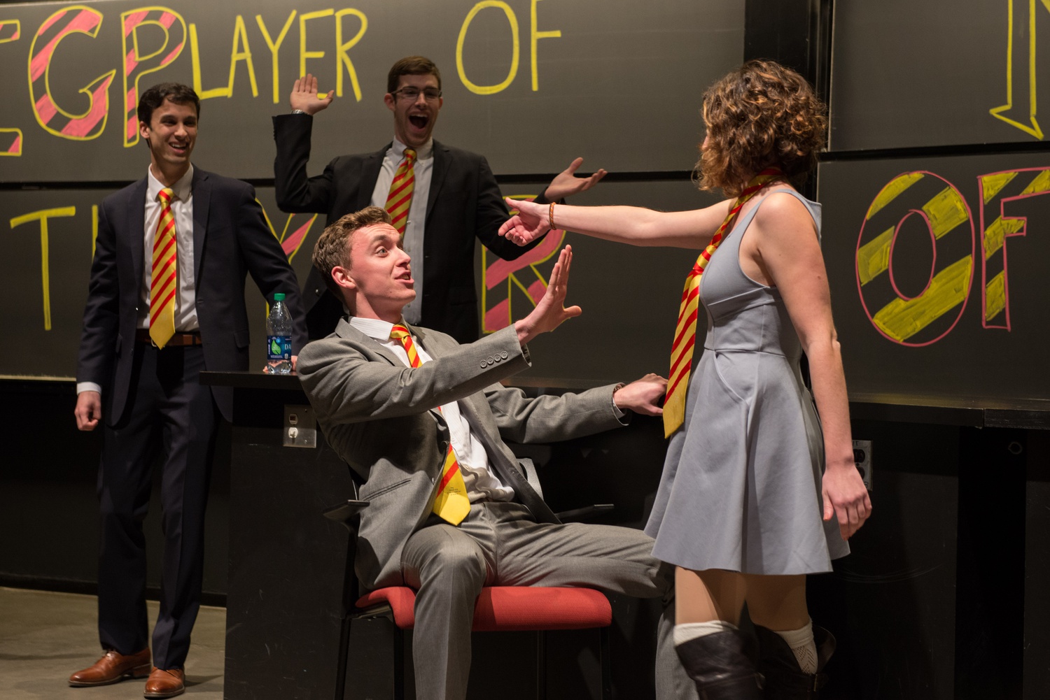 Kira S. Brenner '18 pretends to hold a gun to Mike A. Skerrett's '18 head in a sketch about helicopter moms. 