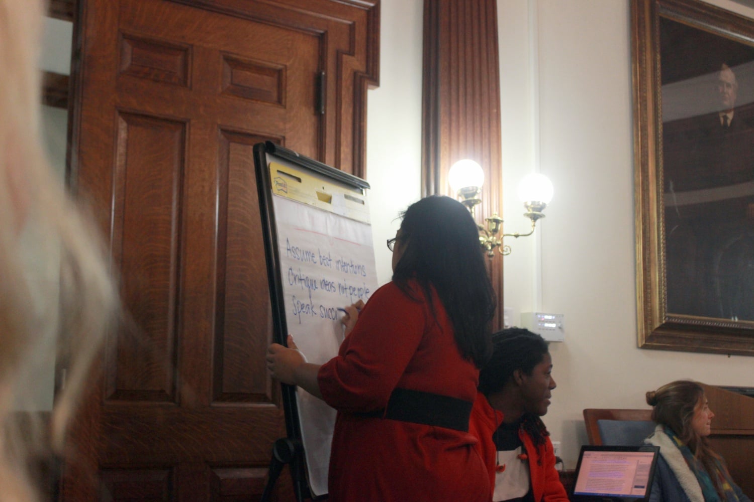 Former Assistant Dean for Equity, Diversity, and Inclusion Emelyn dela Peña at an event in the wake of a diversity task force report. Dela Peña left the College in October, and the College has not yet found a replacement.