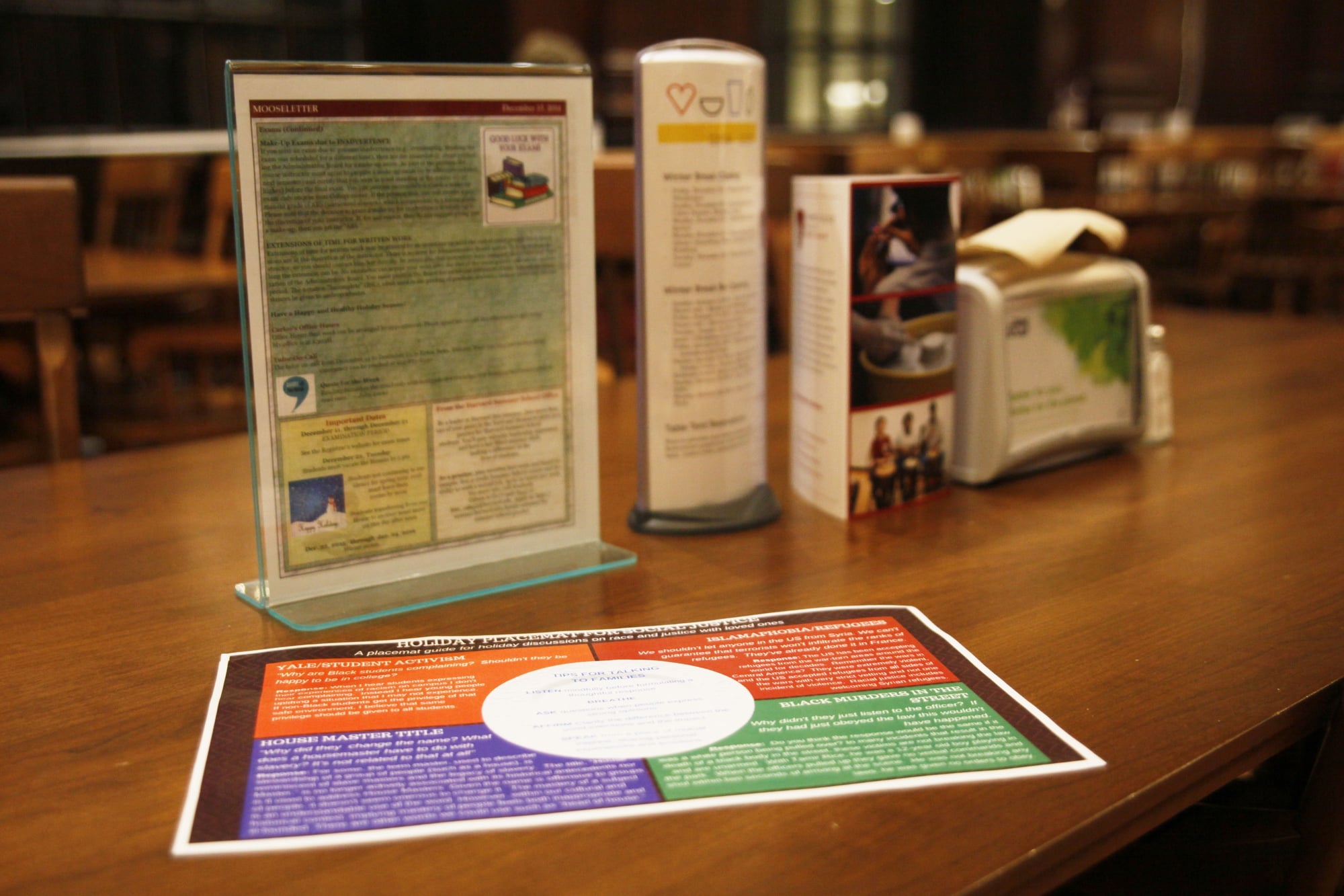 Last week, the College outfitted a number of dining halls with laminated guides printed with what purports to be advice for students discussing issues related to race and diversity with family members. Aaron I. Henricks ’16 said he found the publication of the placemats by an official Harvard office “beyond inappropriate and arrogant,” criticizing their one-sided presentation of “highly debateable subjects.” The placemats offer a single response to each proposed question.