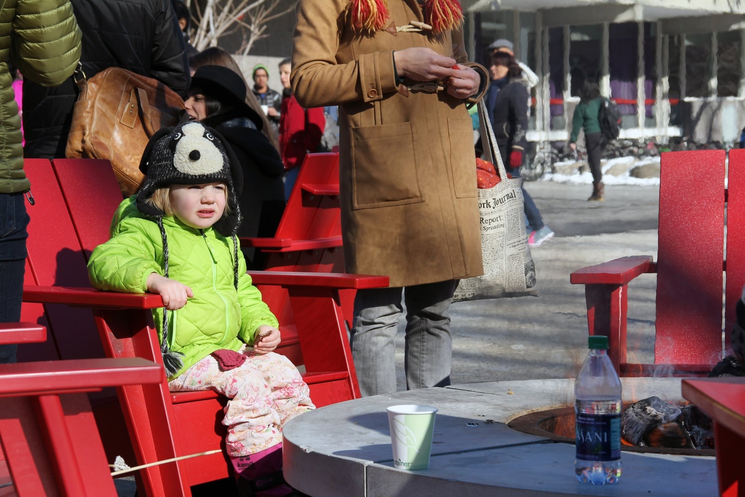 Verity Baldwin, 3 years old, enjoys a s'more at the kickoff event Monday for the Science Center plaza skating rink. The event was open to the public. 