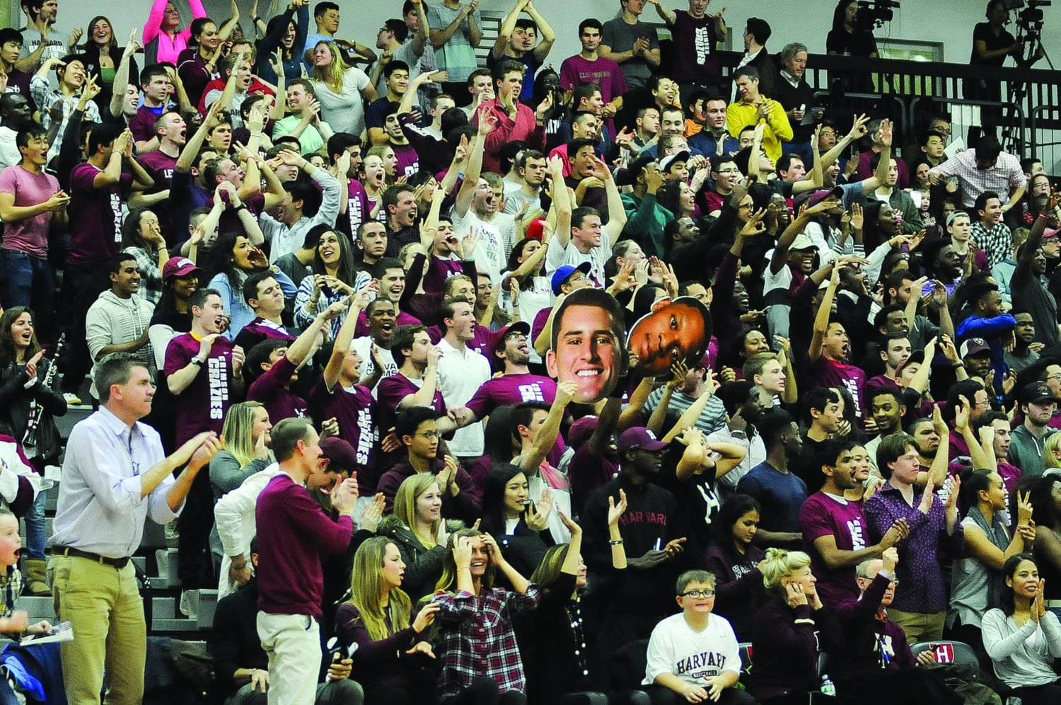A crowd of students cheers on the Harvard men’s basketball team at their Saturday home game against the Columbia Lions. While ahead at the end of the first half, Harvard then fell behind, losing by one point. 
