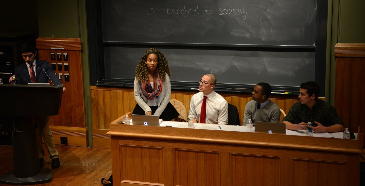 In a debate hosted by the Harvard Political Union, Simone Abegunrin ’18 stands to give a qualification in support of political correctness. “Political correctness is a new concept, and with new concepts come growing pains and mistakes along the way.” 