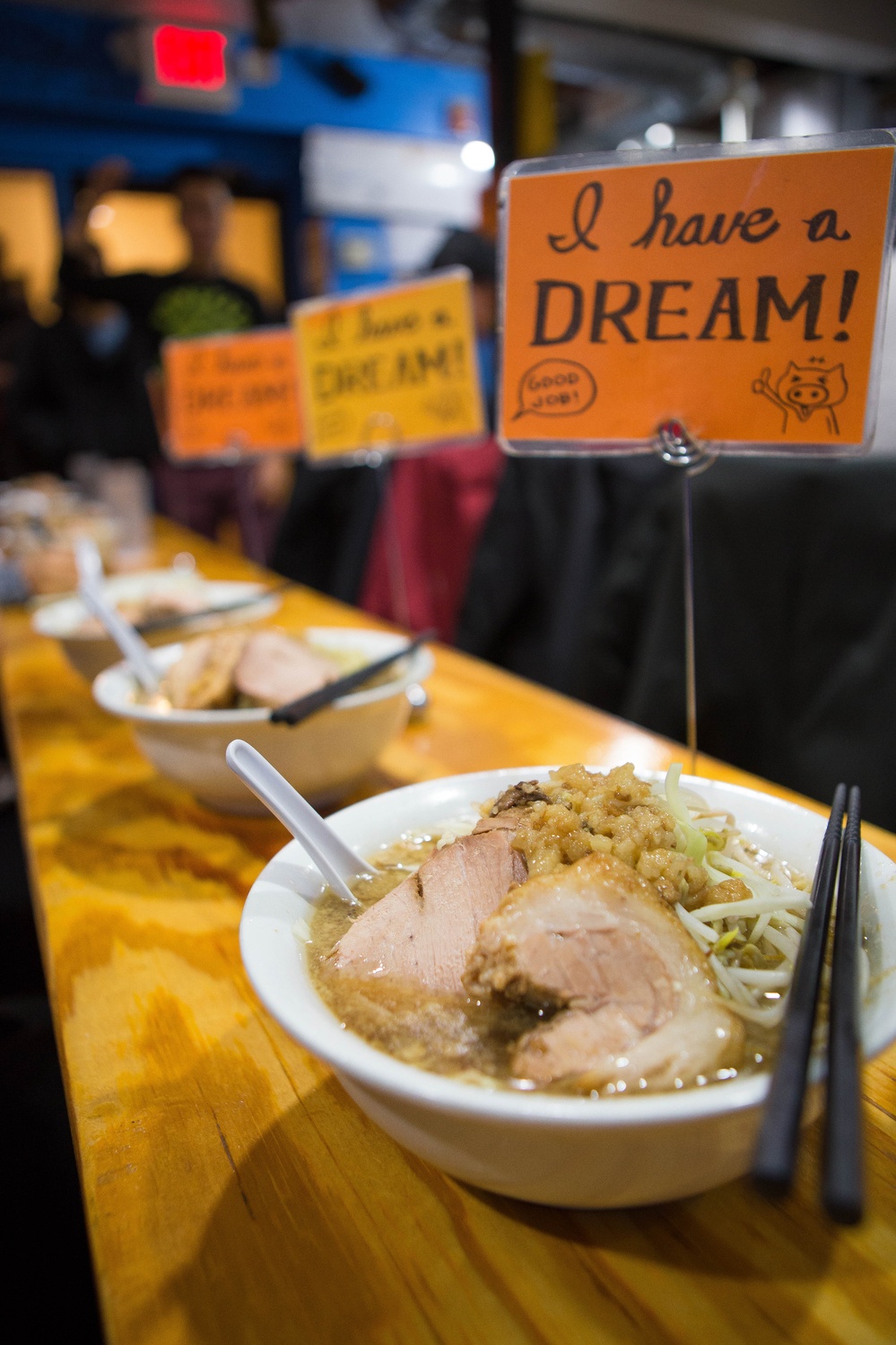 At Yume Wo Katare, a Japanese ramen restaurant in Porter Square, after customers finish their bowl of ramen, they stand up to share their short term and long term dreams.