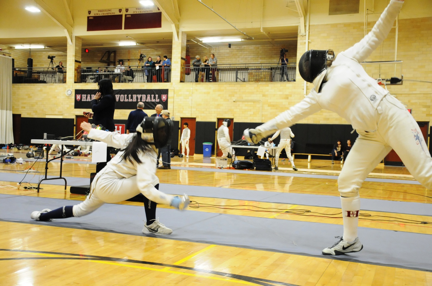 Shawn A. Wallace ’19 scores in the closing epee match against Brandeis on Wednesday. The women’s fencing team beat Brandeis 21-6, with a 7-2 record in the epee division.
