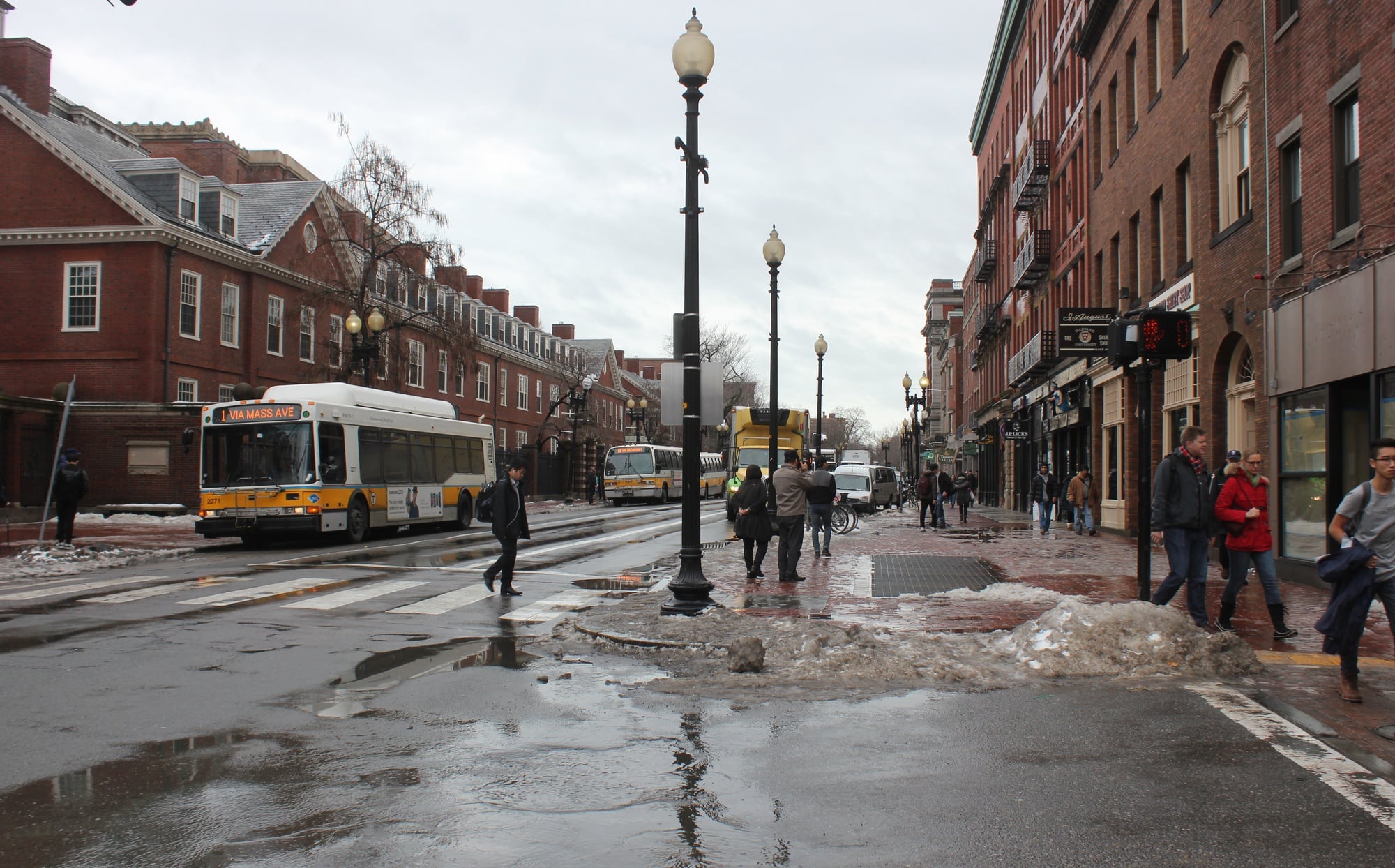 Despite a weekend of subzero temperatures in the area, melting snow filled the streets of Cambridge as a unusually warm high of 55 degrees Fahrenheit hit the area on Tuesday.