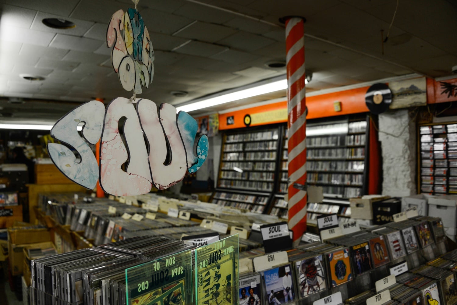 In Your Ear, a tucked away record store on Mt. Auburn, holds a great collection of old CDs, records, and tapes. On Saturday afternoon the store was full of customers sifting through antique records. 