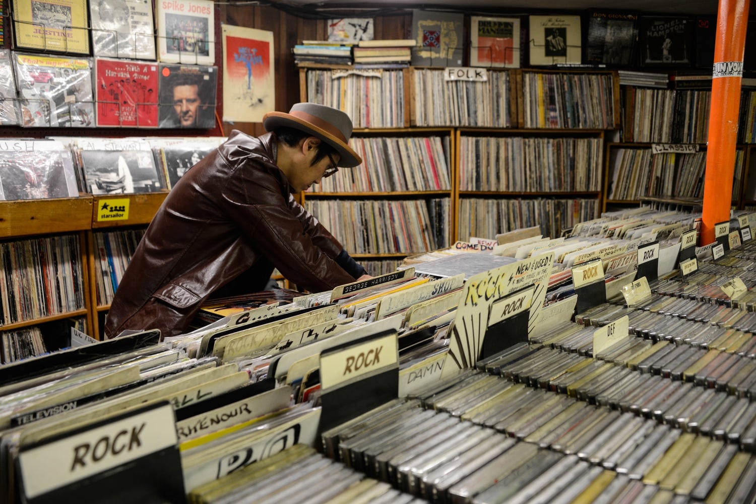 In Your Ear, a tucked away record store on Mt. Auburn, holds a great collection of old CDs, records, and tapes. On Saturday afternoon the store was full of customers sifting through antique records. 