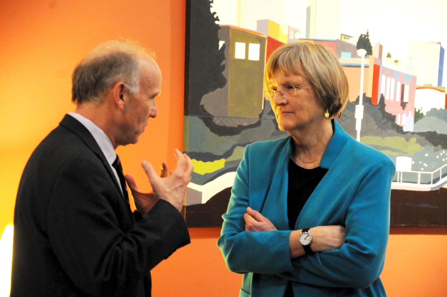  President Drew Faust is greeted by Currier House Faculty Dean Richard W. Wrangham in the Currier Senior Common Room Tuesday evening. President Faust was welcomed to Currier as part of its monthly speaker series, Currier Conversations.
