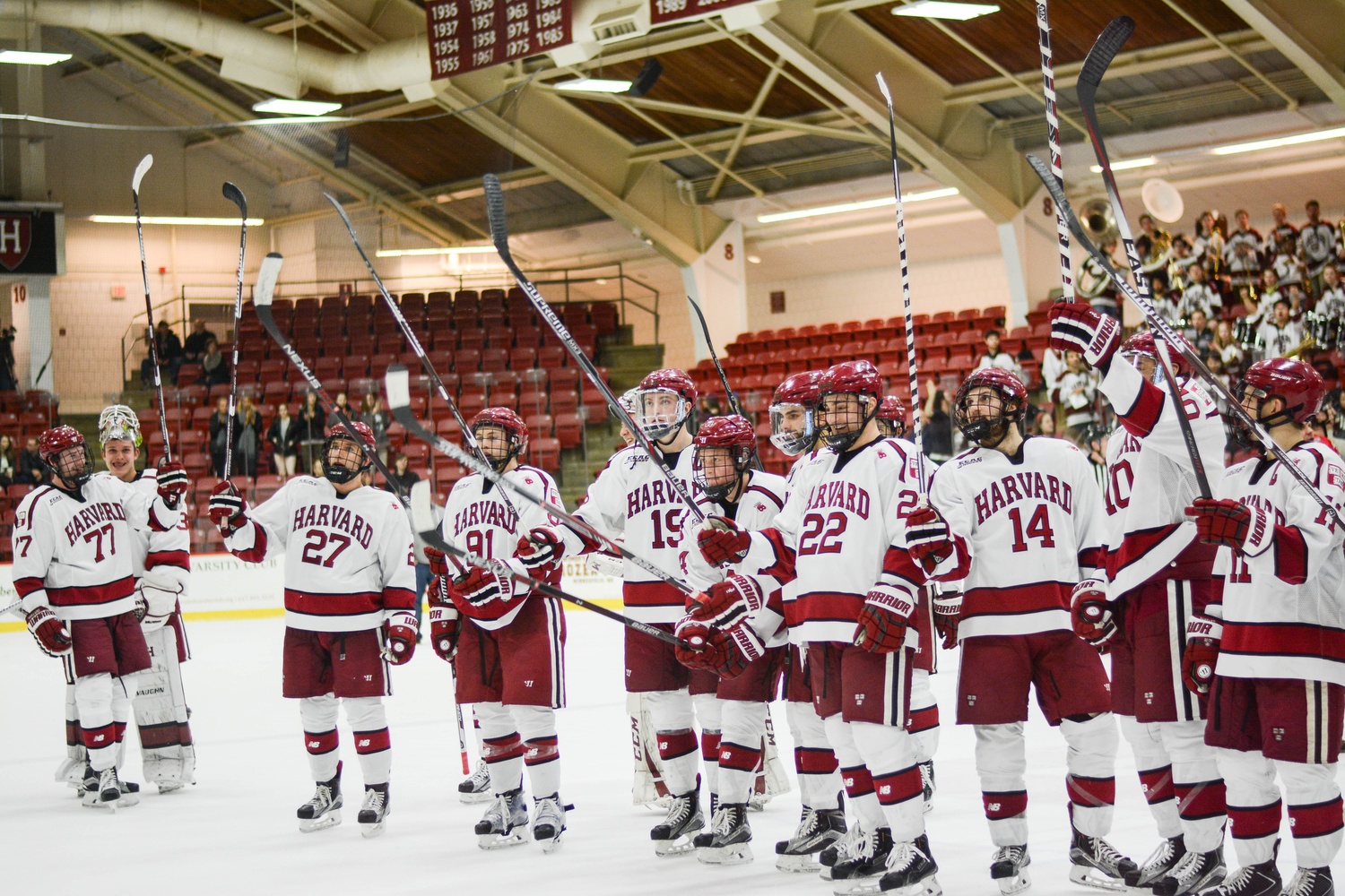 The Crimson salutes the crowd after its final game of the year at the Bright-Landry Hockey Center.