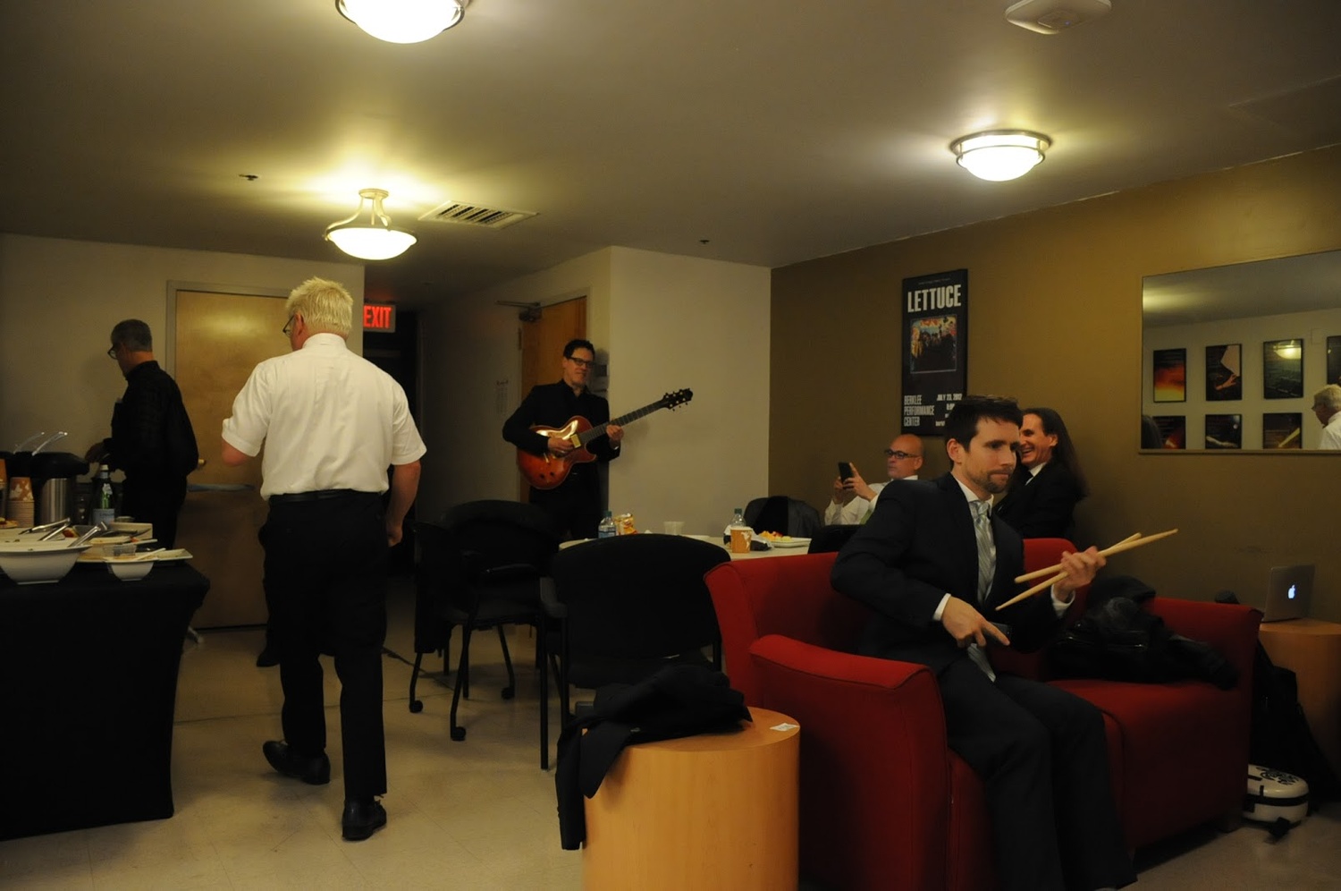 Pink Martini warms up before a show.