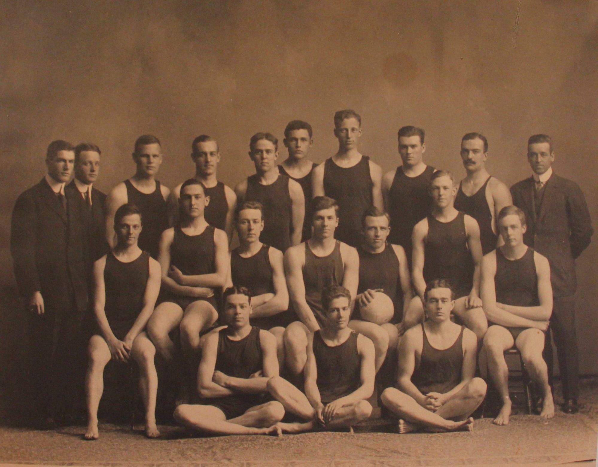 The Harvard Swimming team's group photo. Reed is in the back row, standing fifth from the left.