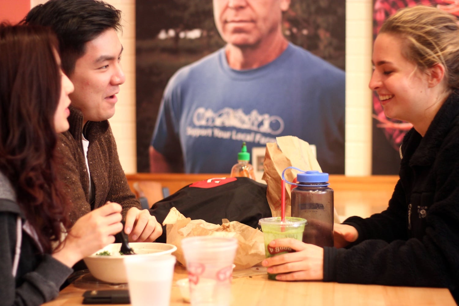 Cassie C. Wang ’17, Evan Hahn ’17, and Charlotte J. Solmssen ’17 enjoy a meal at Harvard Square’s b.good location before it shut it doors for good on Tuesday after more than 10 years of operation. The restaurant is looking for a new location in the Square to reopen after it was forced to close the Dunster Street location because of renovations to the Smith Campus Center.