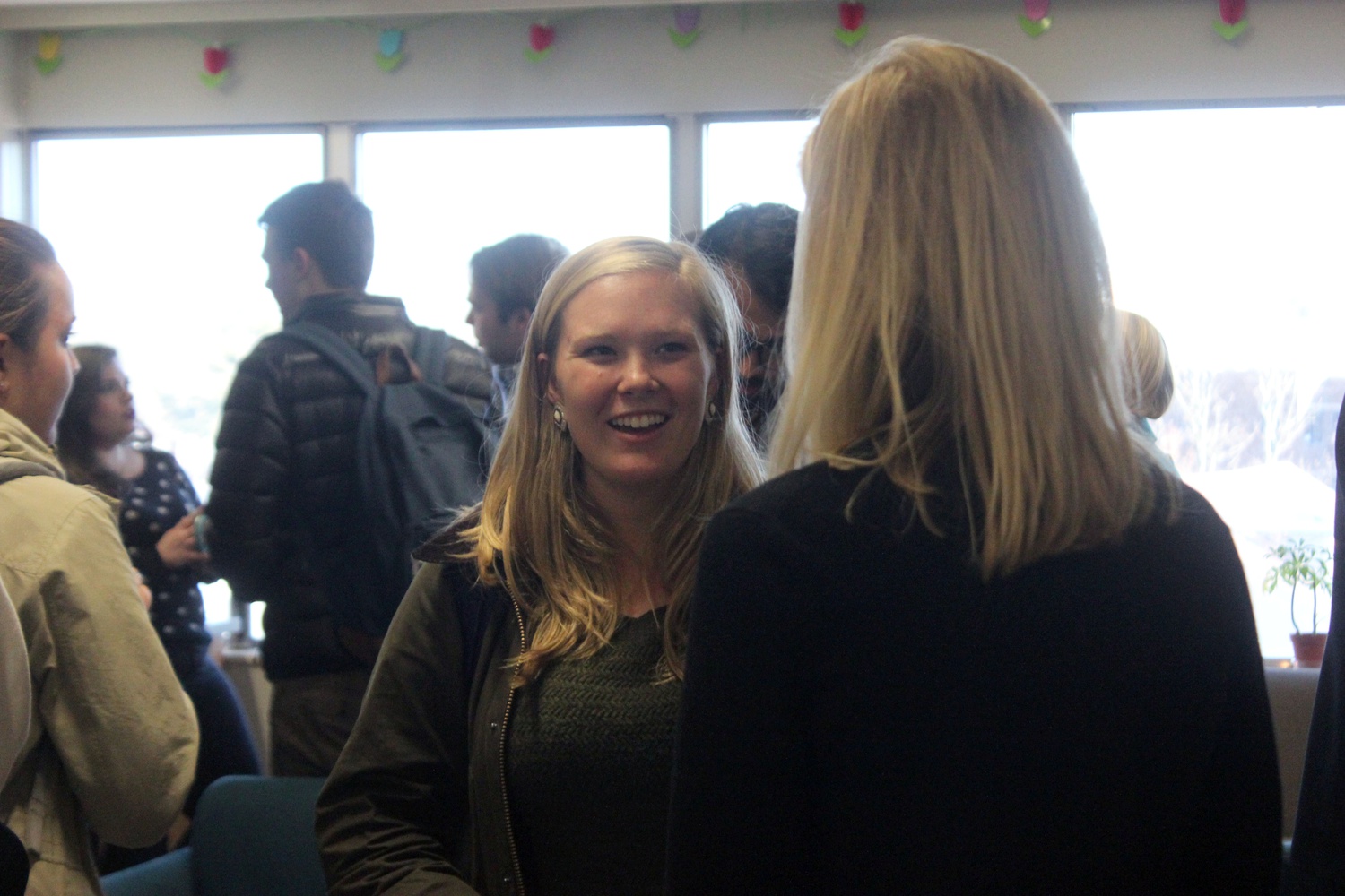 Kate Brady ’19 makes conversation with a Social Studies concentration adviser at the Social Studies Ice Cream Social Tuesday afternoon. The event was one of the many events being hosted by all 49 concentrations as part of Advising Fortnight, a two-week period of events, panels, and office hours intended to help freshmen discover more about their possible future concentrations.