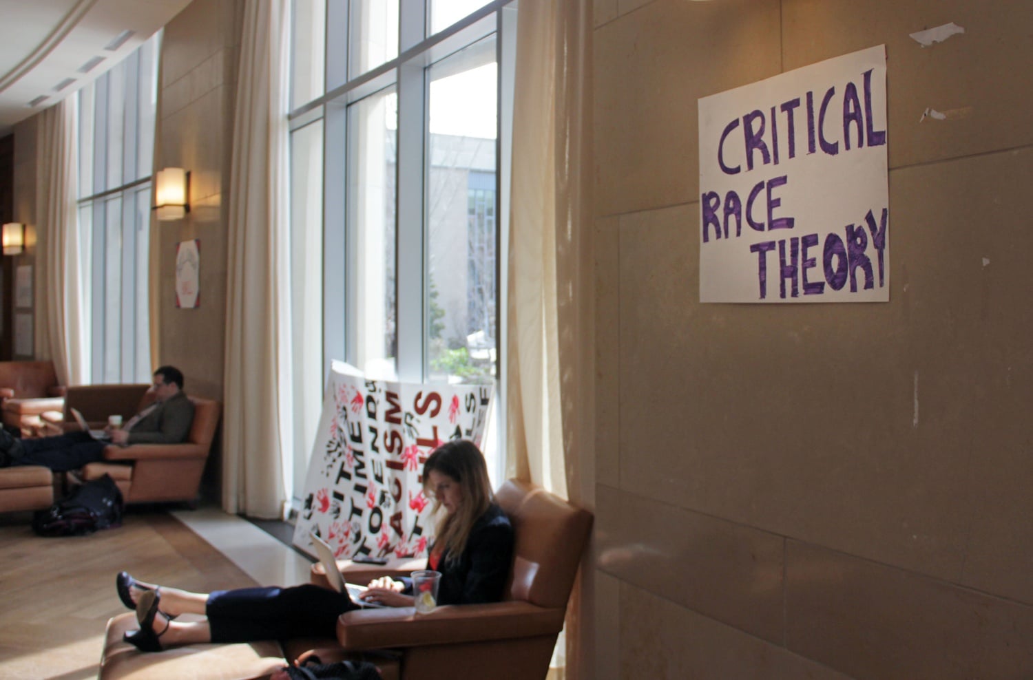 A poster hangs in the Harvard Law School's Caspersen Student Center lounge, called "Belinda Hall" by some students, in honor of a former slave of prominent Law School benefactors. 