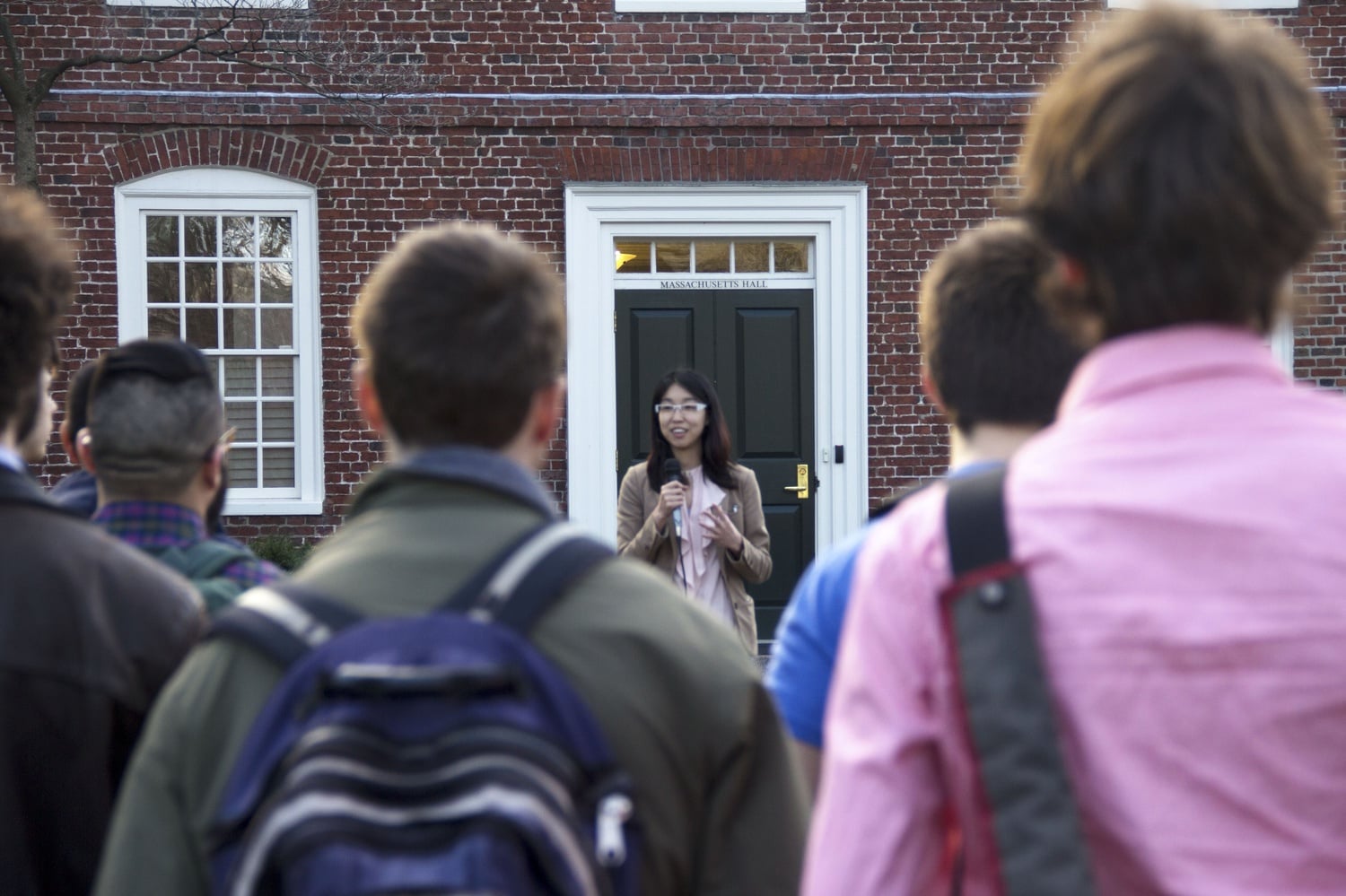 Jean Fan, a Ph.D. student in Biological & Biomedical Sciences at the Graduate School of Arts and Sciences, speaks at a protest outside Massachusetts Hall Friday. The protest was in demand that more steps be taken to increase diversity at the school, which had only eight percent underrepresented minorities in the 2014-2015 academic year.