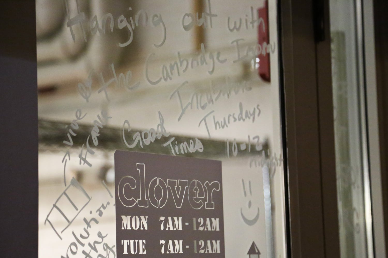 Farewell notes cover Clover's windows at its closing party last week.