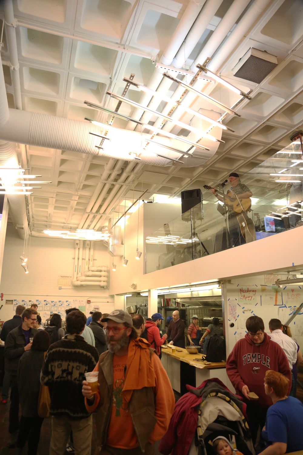 Guests enjoy refreshments and live music at Clover's closing party last week. 