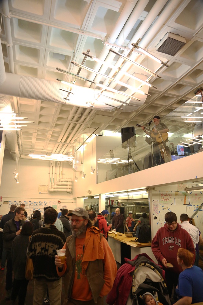 Guests enjoy refreshments and live music at Clover's closing party last week. 