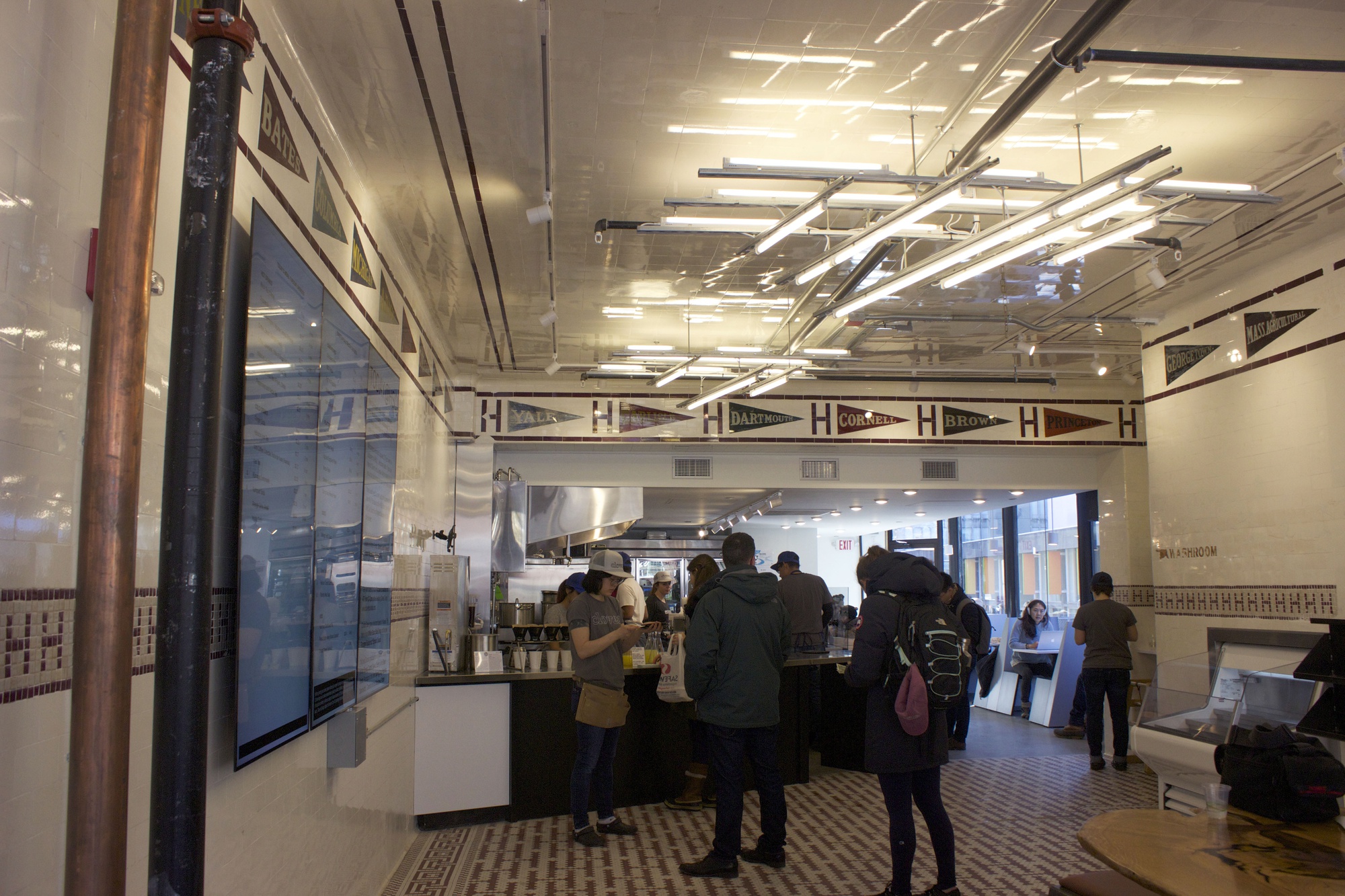 Patrons wait in line at Clover’s new location in Harvard Square.