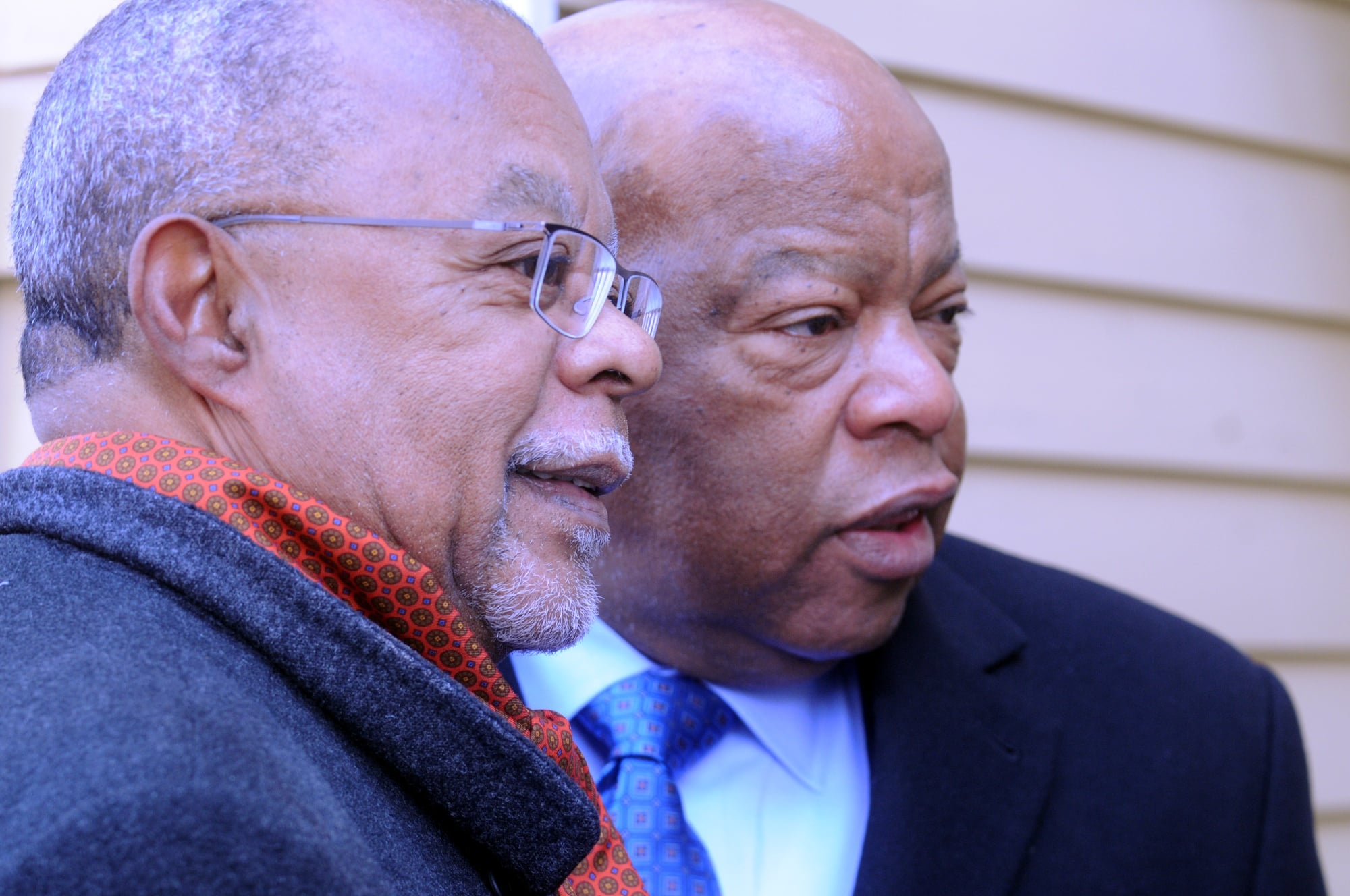 Professor Henry L. Gates, Jr. and Georgia Congressman John R. Lewis celebrate the unveiling of the Wadsworth House plaque. The plaque bears the names of Bilhah, Venus, Titus, and Juba, four enslaved persons who labored in the house in the eighteenth century.