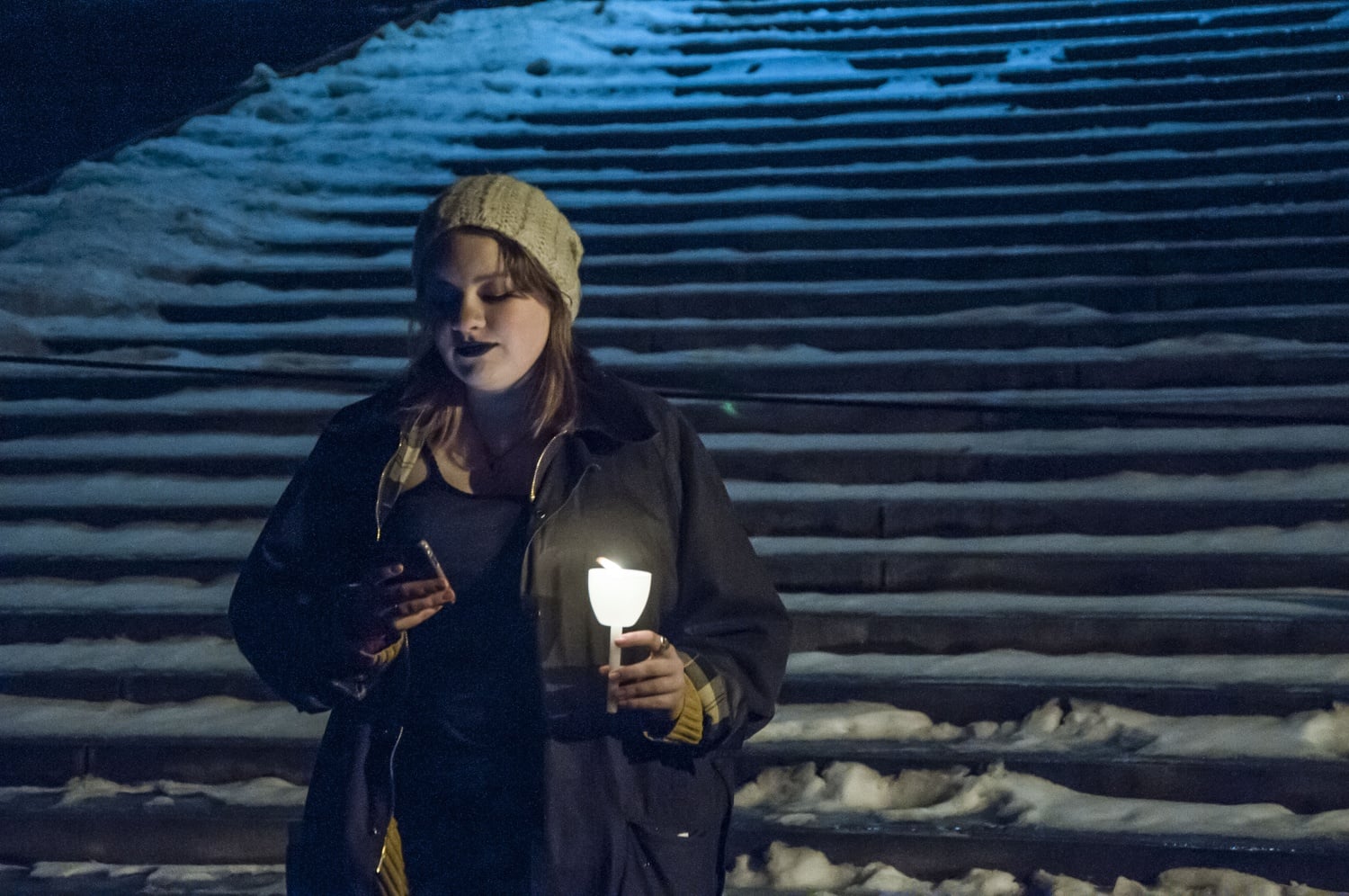 Megan E. Sims ‘18 reads a spoken word poem by the Widener Library steps at Hear Me Now - A Take Back the Night Event. The program, jointly hosted by OSAPR, Response Peer Counseling and CARE, featured performances by poets and musicians and concluded with a reading of anonymous submissions written on the subject of sexual assault.