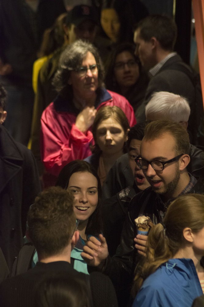 Cantabrigians pack The Garage in search of free Ben & Jerry’s ice cream. Neither rain nor long waits deterred denizens desiring dessert Tuesday.