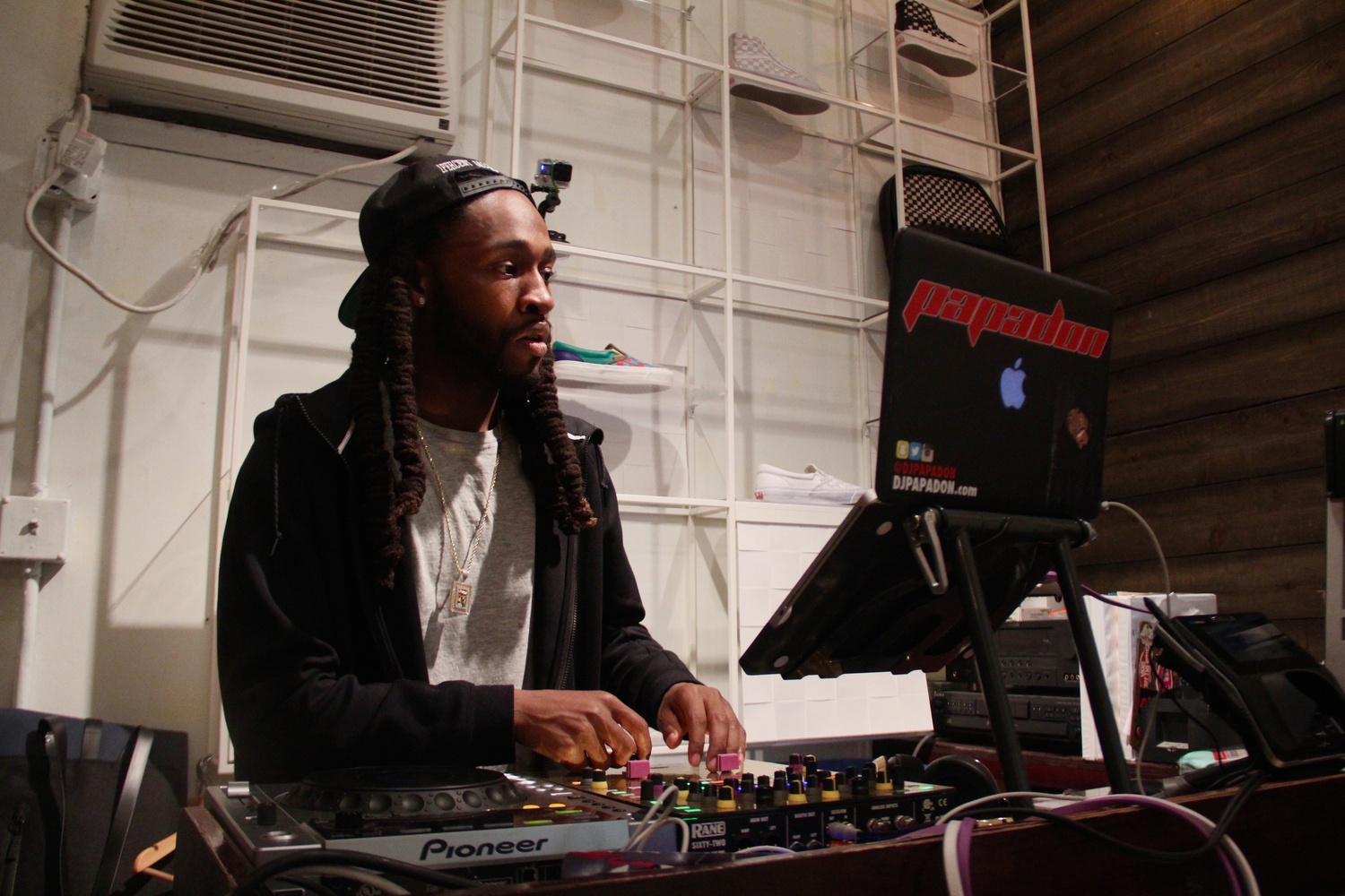 At Bodega, music is a large part of the shopping experience. DJ Papadon controlled the tracks on Monday with a wide mix of music genres. He stood a step up in the back of the store, visible from every corner, in direct eyesight as customers walked in.