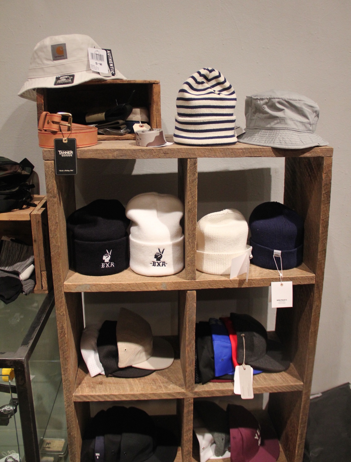 Beanies and bucket hats are trendy as well; Bodega sells the latest styles in simple, workable colors.